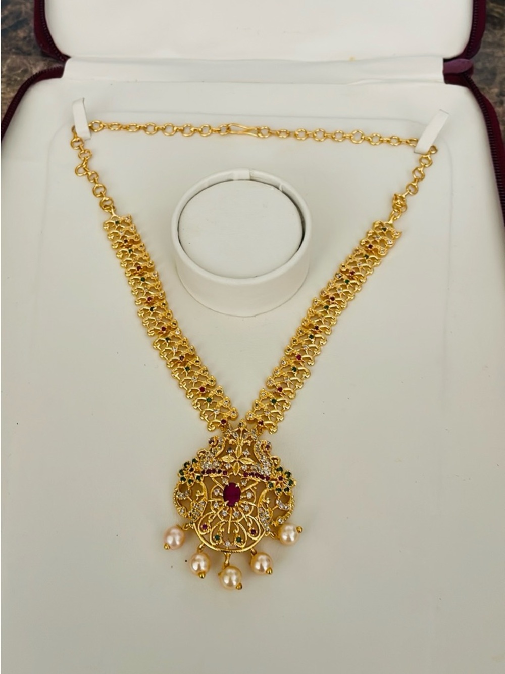 Classic Gold-Tone Pendant Necklace with Ruby Accents by